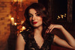 © idda118 - sexy brunette with evening candlelight