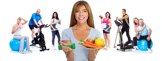 Wall Mural - Healthy woman with vegetables and fruits.