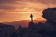 © Carlos Moron Villar/ADDICTIVE STOCK - Man silhouette on the summit at sunset