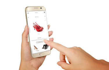 Wall Mural - Online shopping with smart phone. Isolated phone in woman hand. Buying women shoes on online store.