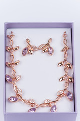 Beautiful necklace with earrings in a purple gift box