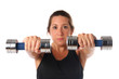 © Julián Rovagnati - Young woman exercising with dumbbells. Selective Focus