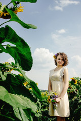 Wall Mural - stylish gorgeous rustic bride with bouquet in sunny sunflower fi