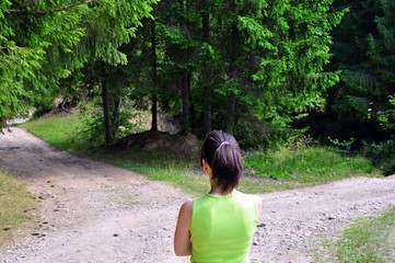 Girl with a choice near the forked road