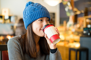 Woman enjoy her morning coffee in cafe