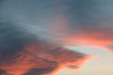Wall Mural - abstract background of defocused blurred flame clouds in the sky
