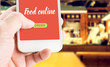 Hand holding mobile with Order food online with blur restaurant