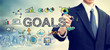 © Tierney - Businessman drawing Goals concept