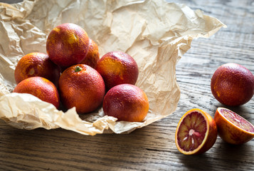 Canvas Print - Red tangerines on the wooden background