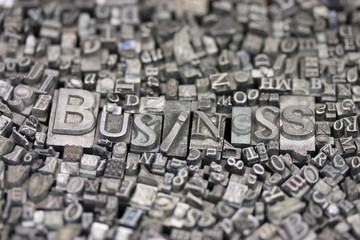 close up of typeset letters with the word business