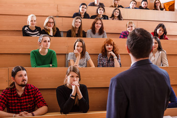 Teacher explaining something to students