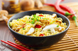 Traditional Asian instant noodles meal with shiitake mushrooms and vegetables