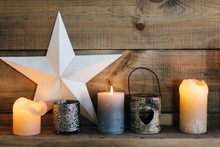 Composition With Candles, Stars On Wooden Background 