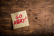 © UMB-O - go away! - motivation paper note on wood noticeboard