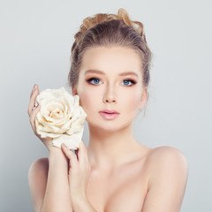 Young Woman with White Rose. Spa Model