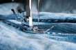 Part of sewing machine and jeans cloth