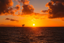 Oil Platform At Sunset