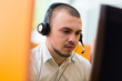 © Myvisuals - Portrait of confident male customer service representative with