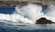 Una ola chocando contra una roca en la playa de Riazor de A Coruña,Galicia ,España