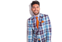 Casual Man In Plaid Jacket And Orange Tie