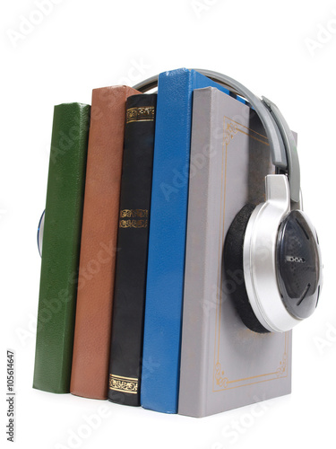 Fotografia, Obraz Stack of books and headphones on white background