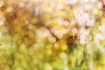 Wall Mural - Abstract blurred background with rain drop on glass mirror