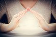 © Photocreo Bednarek - Light under woman's hands in gesture of protection, care.