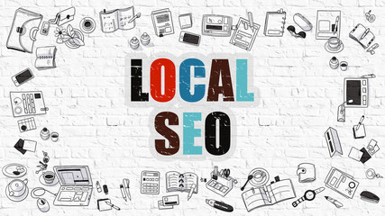 Wall Mural - local seo, local search engine optimization. multicolor inscription on white brick wall with doodle 