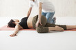 © Monet - Women are doing a stretch twist the waist