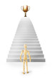 Man stands in front of stairs ascending up to the prize. Abstract image with a wooden puppet