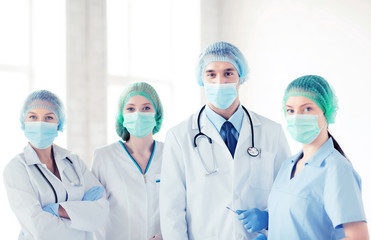 Wall Mural - group of doctors in operating room