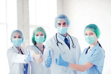 Wall Mural - group of doctors in operating room