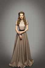 Woman Long Dress, Fashion Model In Historical Gown Over Gray