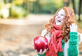 Wall Mural - laughing beauty with apple