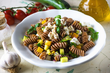 Canvas Print - Whole wheat pasta with vegetables and feta