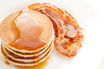 Wall Mural - Pancakes with maple syrup and bacon. Breakfast.