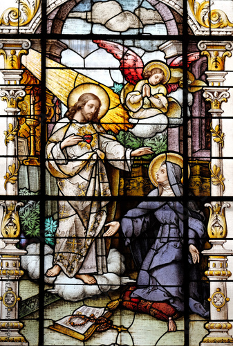 Obraz w ramie Jesus and Saint Margaret Mary Alacoque, stained glass window in the Basilica of the Sacred Heart of Jesus in Zagreb, Croatia