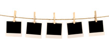 Several Blank Polaroid Style Instant Photo Print Frames Hanging