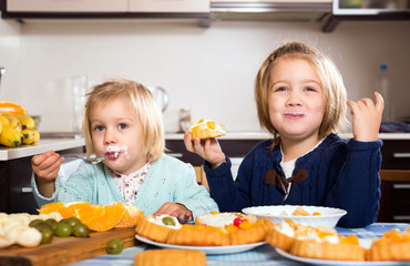 Wall Mural - Girls eating pastry dessert