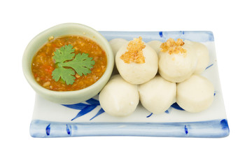 Dish of steamed fish ball and spicy dip  isolated on white backg