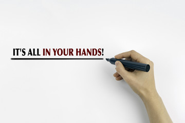 Wall Mural - Hand with marker writing: It's All in Your hands!