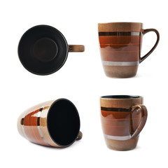 Empty brown ceramic mug isolated