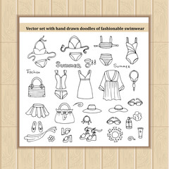 Vector set with hand drawn isolated doodles of swimwear