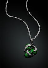 Jewelry Pendant With Green Emerald On Darck Background