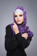 © arttim - A woman in a Muslim scarf