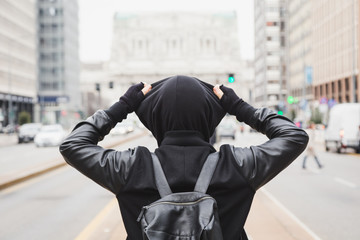 Stylish bearded man posing in the street