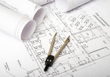 Fototapeta  - Architecture plan and rolls of blueprints