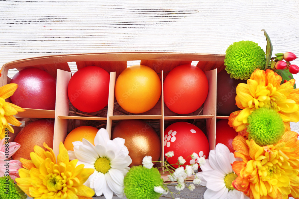 Easter eggs in a box, top view