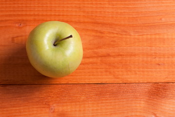 Wall Mural - green apple on the table