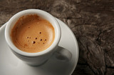 Closeup cup of coffee espresso with foam